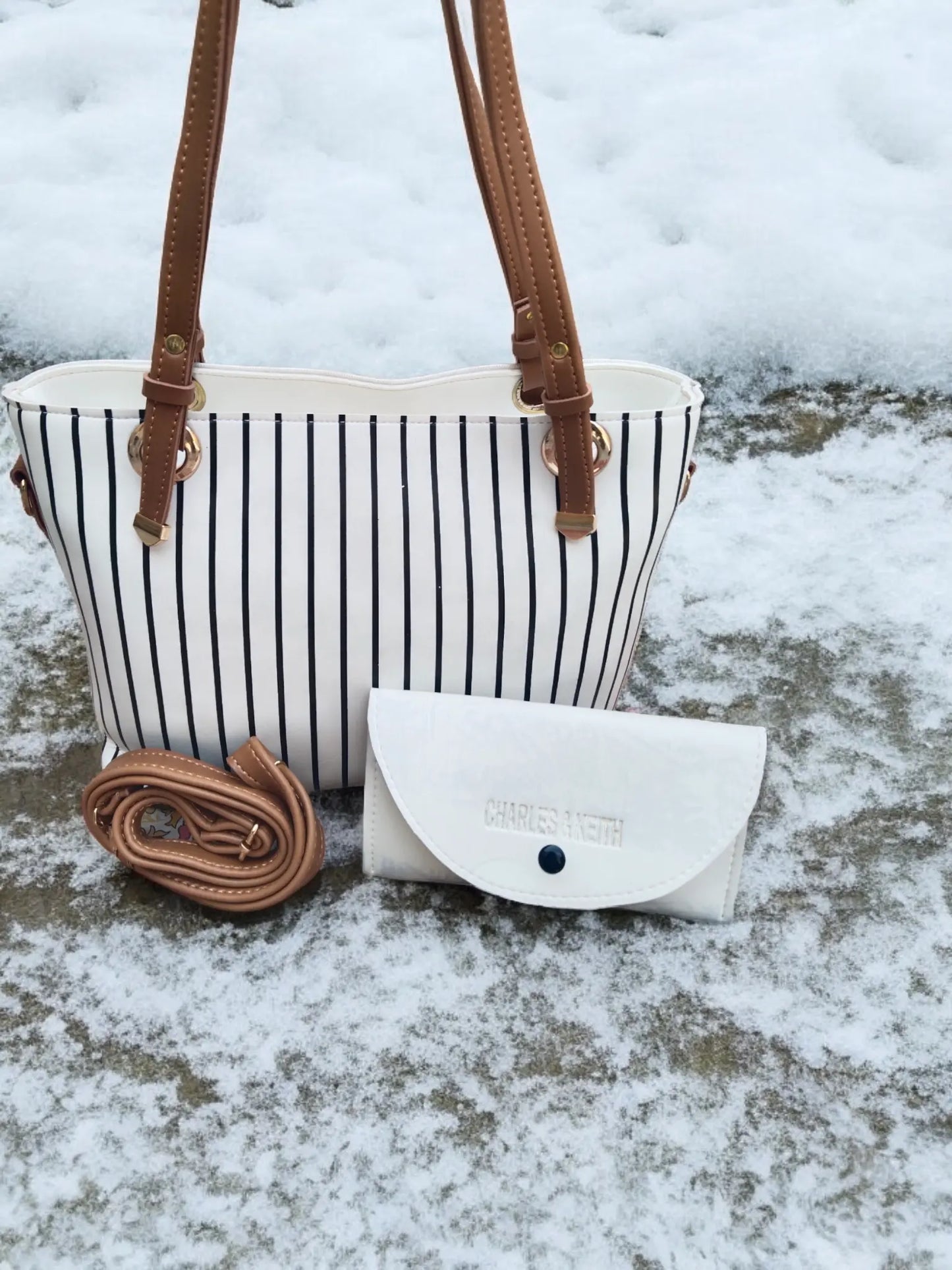 Elegant White Handbag with Black Stripes & Multi-Use Pouch