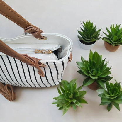 Elegant White Handbag with Black Stripes & Multi-Use Pouch